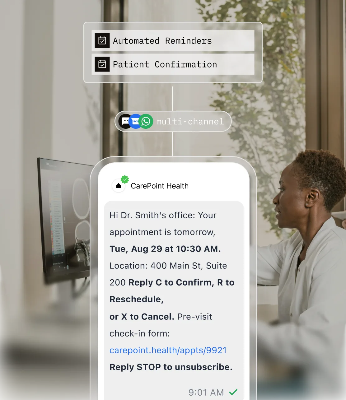 A clinician at a workstation beside an automated appointment reminder confirmed by a patient over SMS